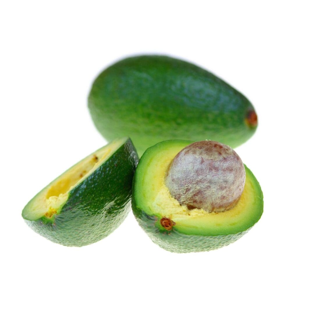 A close up of an avocado cut in half